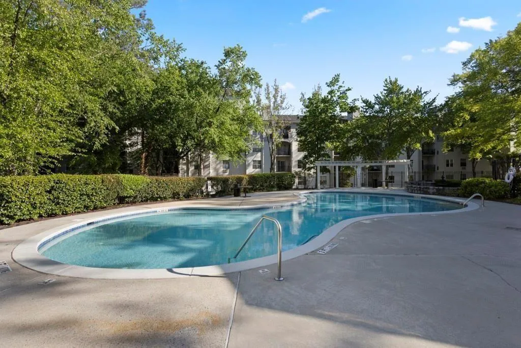 Pool with a patio area