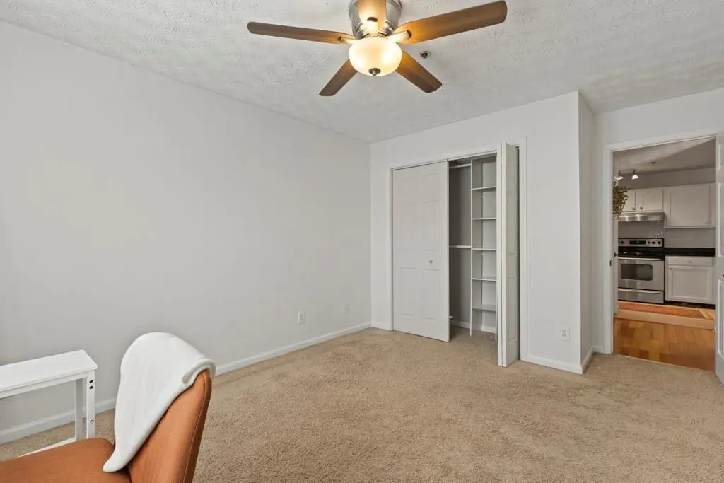 Unfurnished bedroom featuring a textured ceiling,