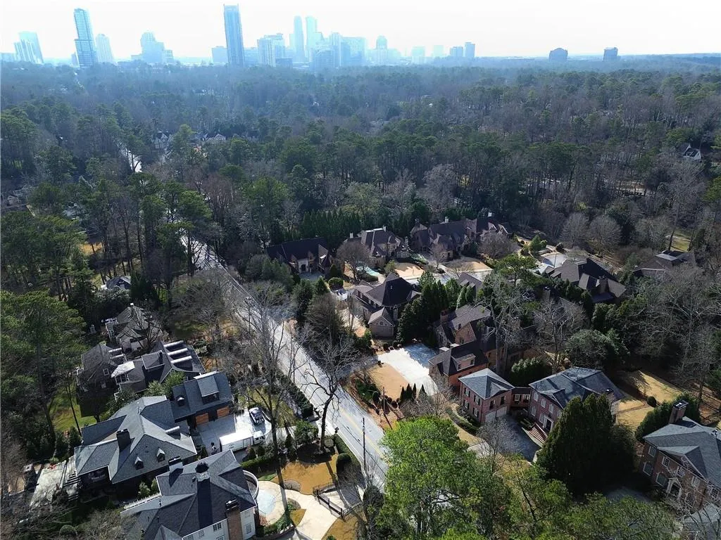 Aerial overview of property's location featuring nearby suburban area