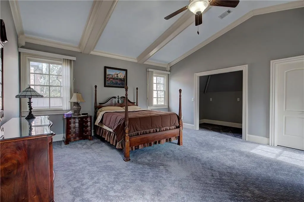 Bedroom featuring carpet flooring and ceiling fan