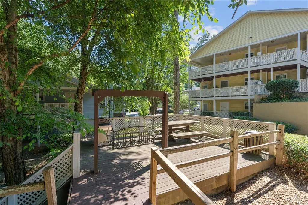 View of home's community featuring a wooden deck