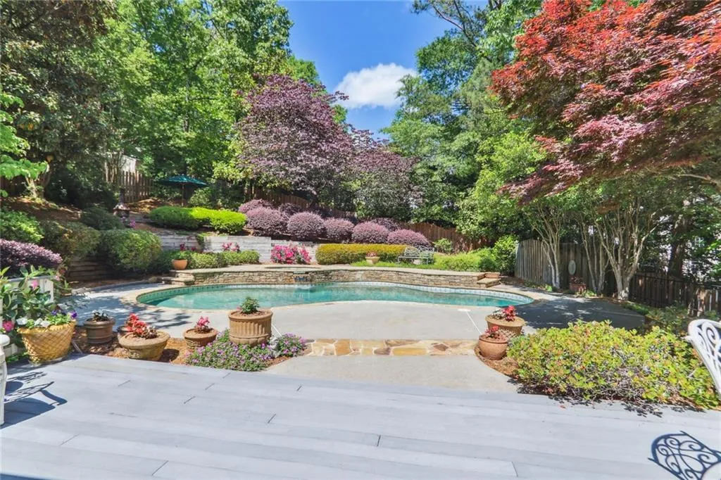 795 Spalding Heights Drive~ This walk-out backyard is the envy of many! No steps separate you from the main level of your home and the gorgeous pool setting.