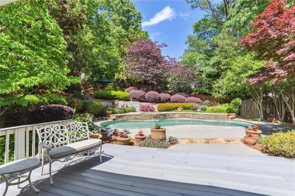 795 Spalding Heights Drive~ Lounge by the pool or read in the shade under the covered porch.