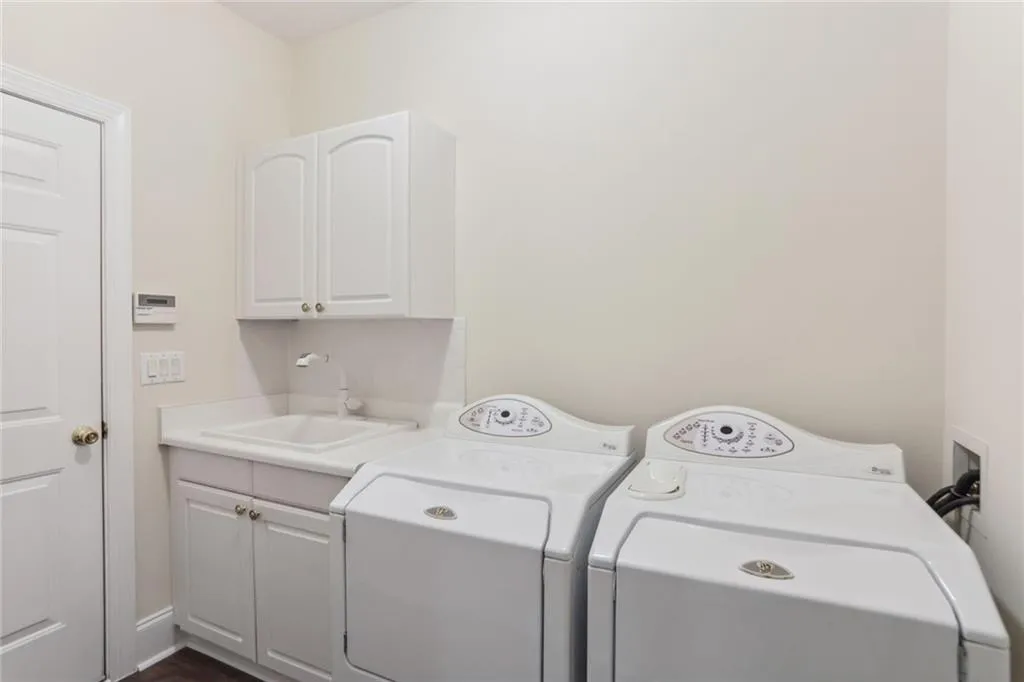 795 Spalding Heights Drive~ Laundry room on the main level with a sink. Not pictured is a nice sized closet.