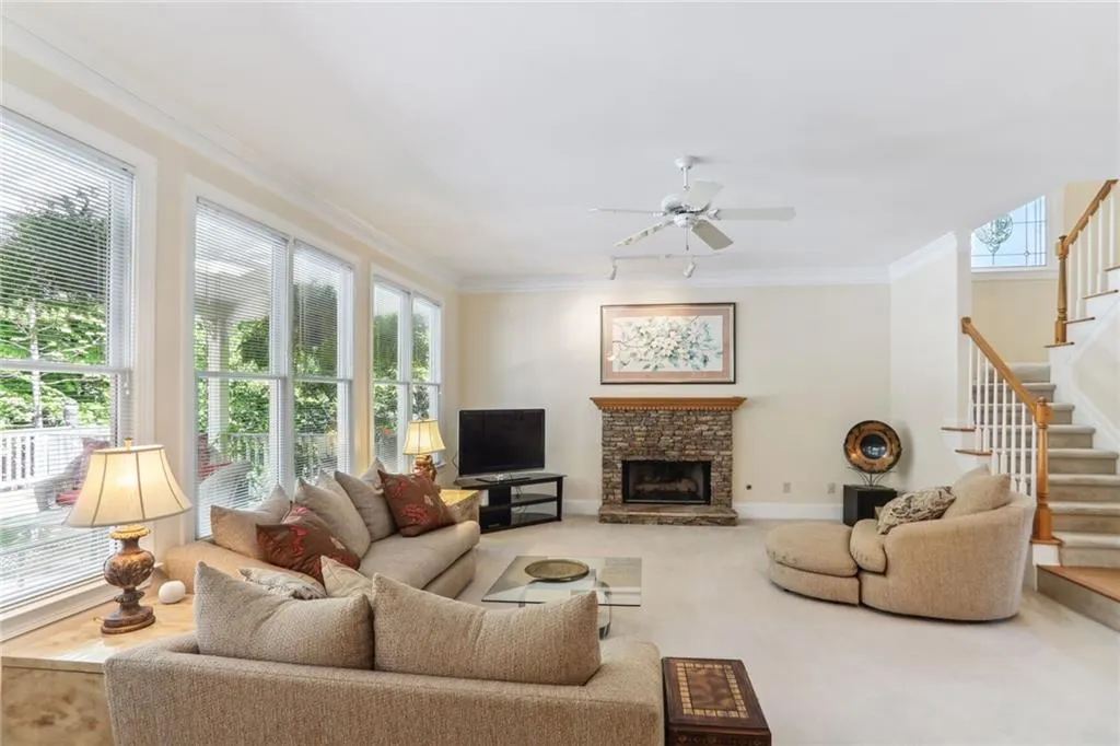 795 Spalding Heights Drive~ The sunken in Family room features a fireplace and beautiful wall of windows. Tons of light!