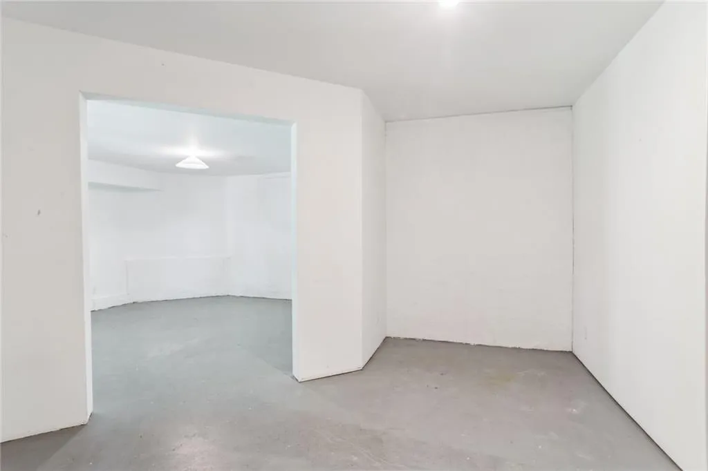 795 Spalding Heights Drive~ Perfect spot for arts & crafts, a Lego room, a playroom, or storage. Not pictured is a plentiful amount of unfinished area- some serving as workshops, storage or utility areas.