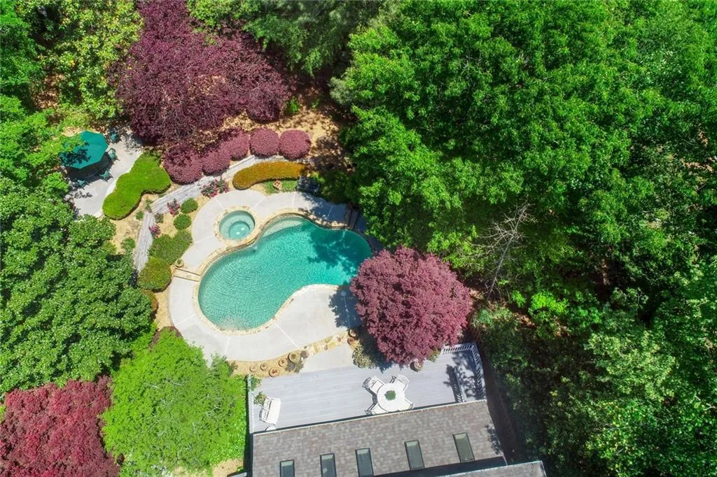 795 Spalding Heights Drive~ You'll never want to stray too far away from home- the backyard provides all the R&R you may need!