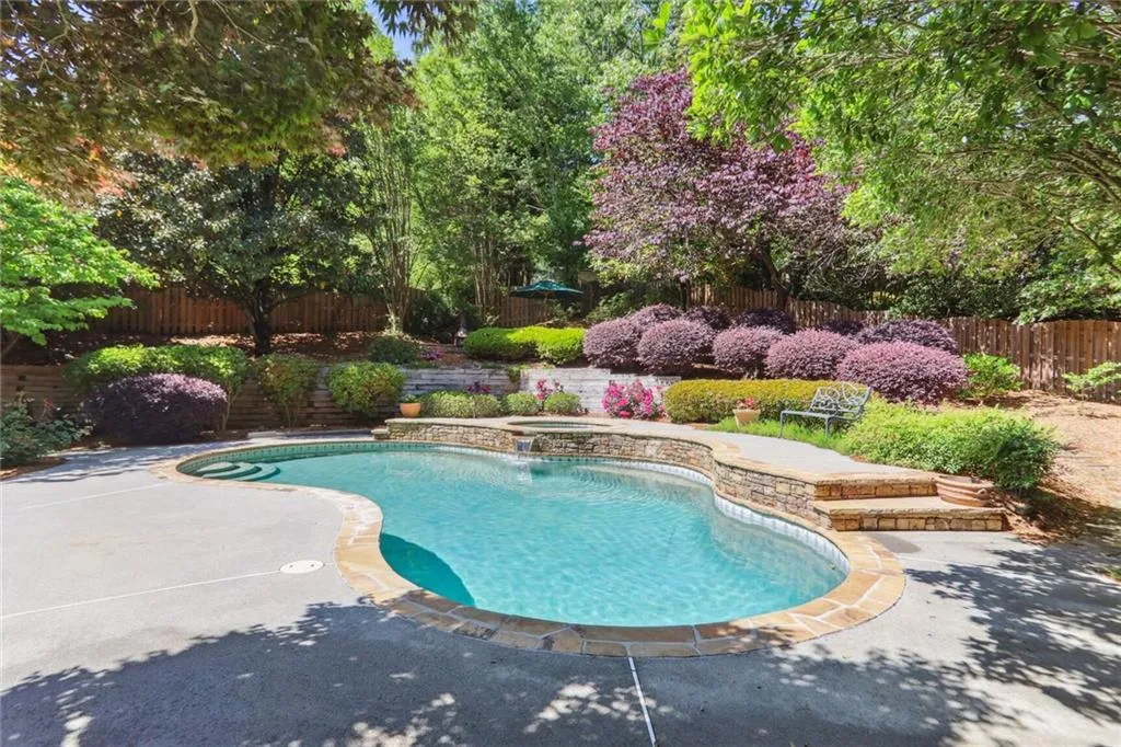795 Spalding Heights Drive~ Just steps from the main level of the home, a backyard oasis awaits!