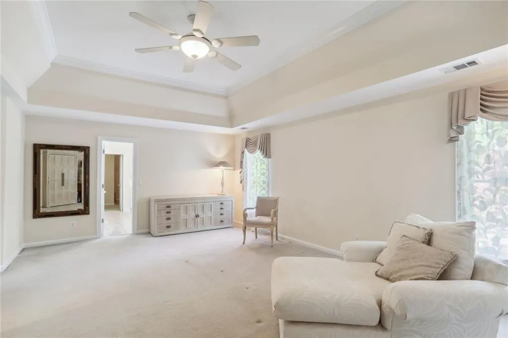 795 Spalding Heights Drive~ Another view of the Primary Bedroom which shows off the beautiful trey ceiing and the ensuite bathroom.