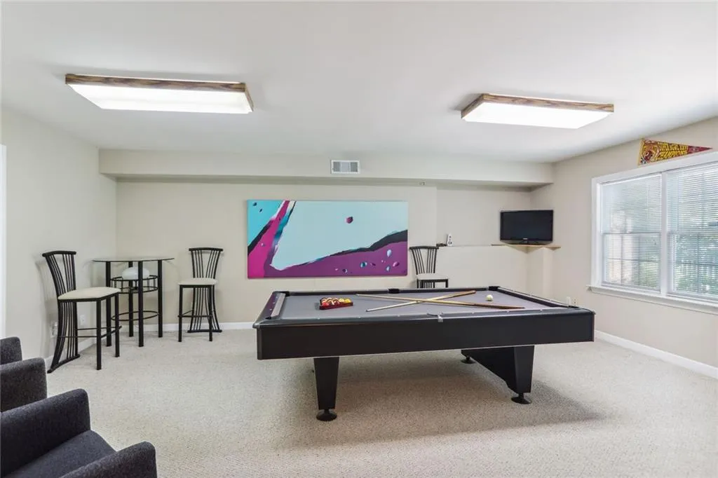 795 Spalding Heights Drive~ Terrace Level Recreation Room is perfect for a lower level movie night or a billiard game.