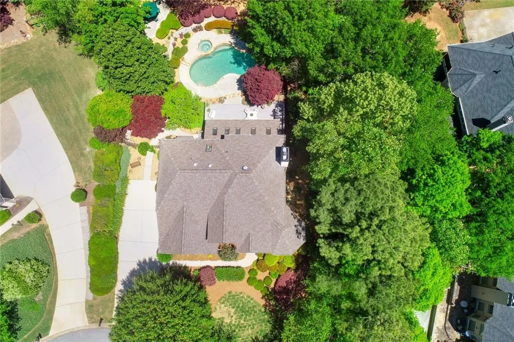 795 Spalding Heights Drive~  The property is roughly a half acre of lush greenery and privacy.