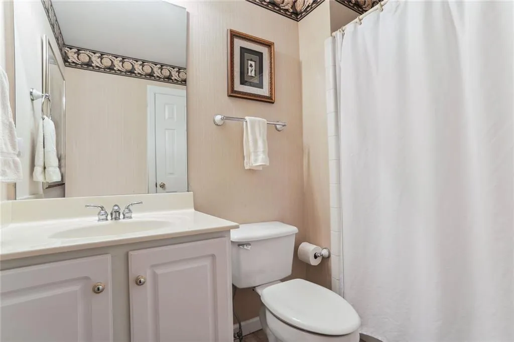 795 Spalding Heights Drive~ Secondary Bathroom #2 also features a tub/shower and a single vanity.