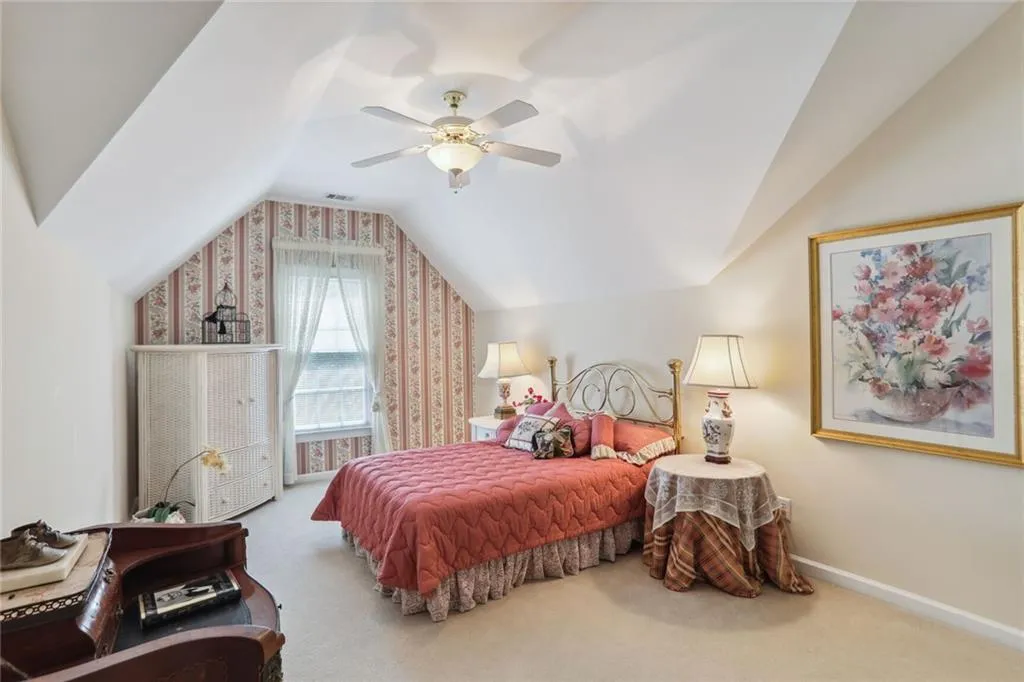 795 Spalding Heights Drive~ The largest of the secondary bedrooms, this room features an angular ceiling, ceiing fan/light fixture and an extra large walk in closet.