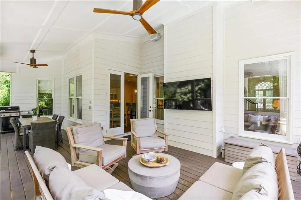 Covered porch with surround sound and built in heaters.