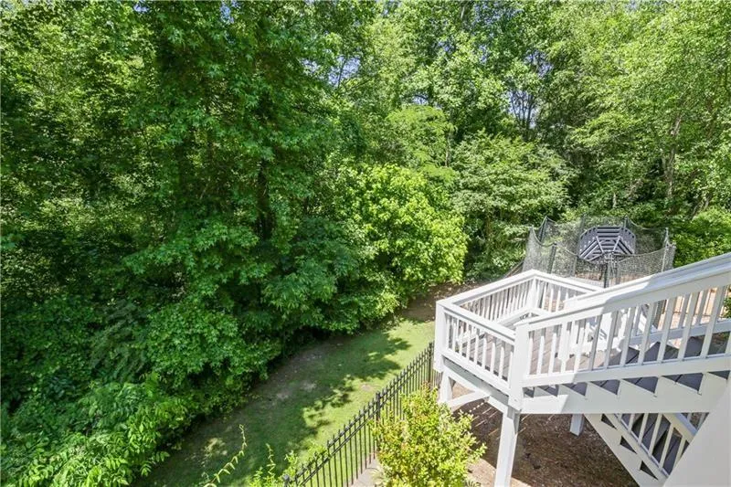 View of stairs from covered porch.