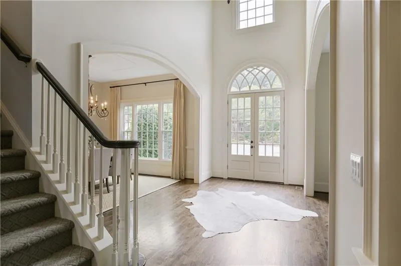 Light filled two story foyer.