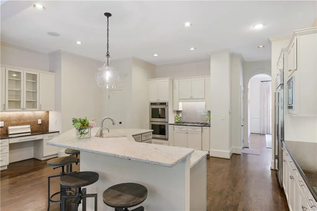 Desk area, walk-in pantry and access to the garage.