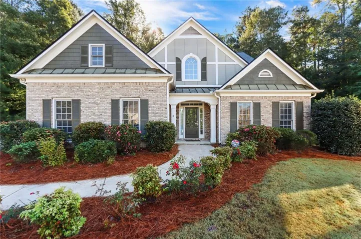 Brick and siding exterior with gabled roof lines