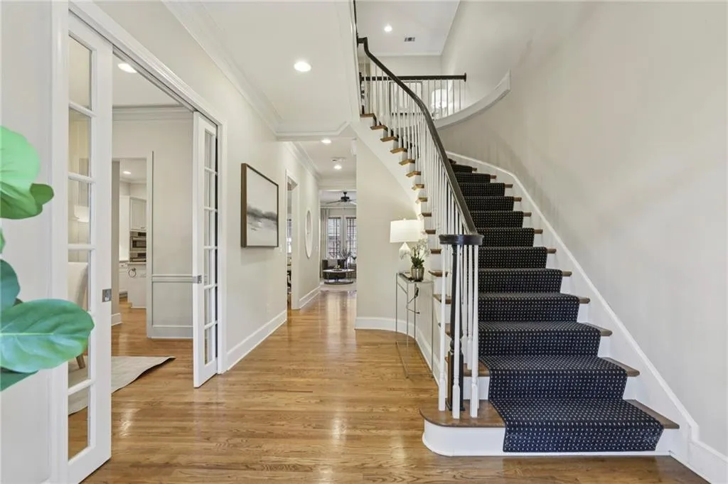 Foyer with sweeping curved staircase
