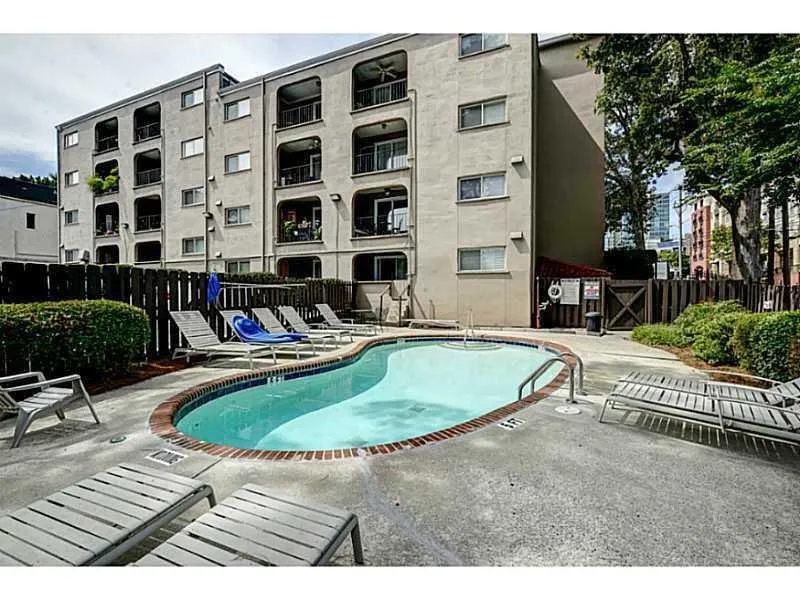 That second patio space visible in the background is your unit!