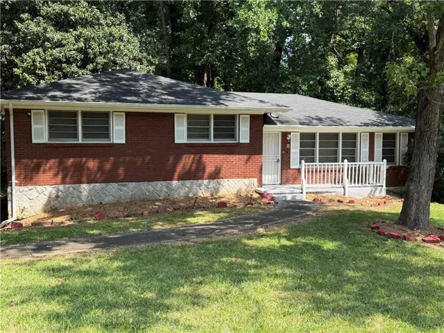 Brick exterior with a stone veneer foundation