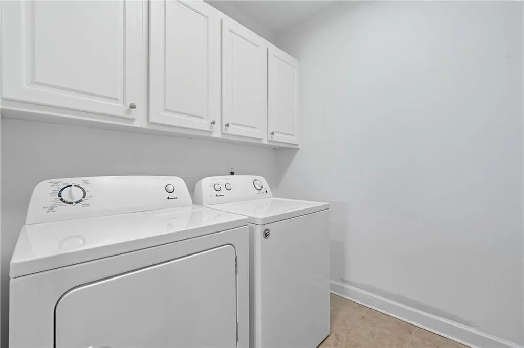 Laundry room with plenty of extra storage
