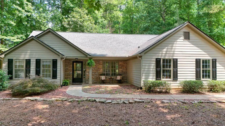 Welcome to this charming 3-bedroom, 2-bath home in Ball Ground!