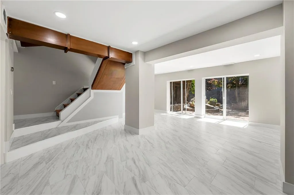 another view of  living room and sliding doors to pario.