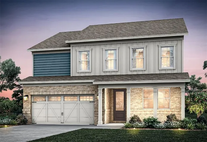 View of front of home featuring an attached garage, brick siding, roof with shingles, and driveway