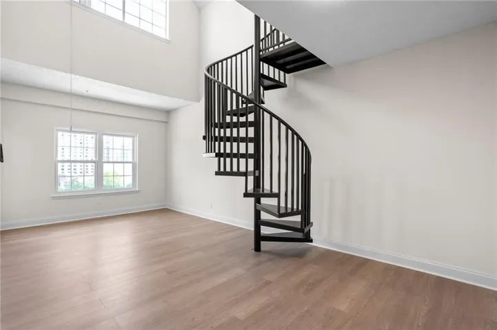 Living Room/Dining Room with Double Height Ceilings