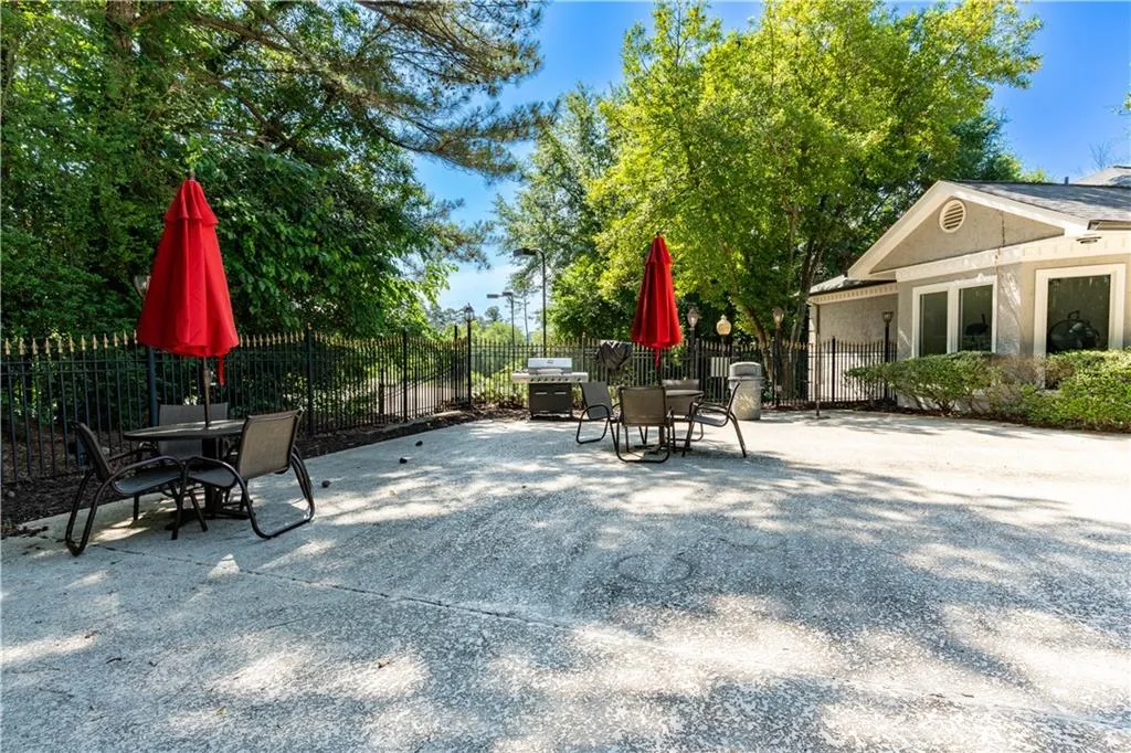 View of patio with outdoor dining area