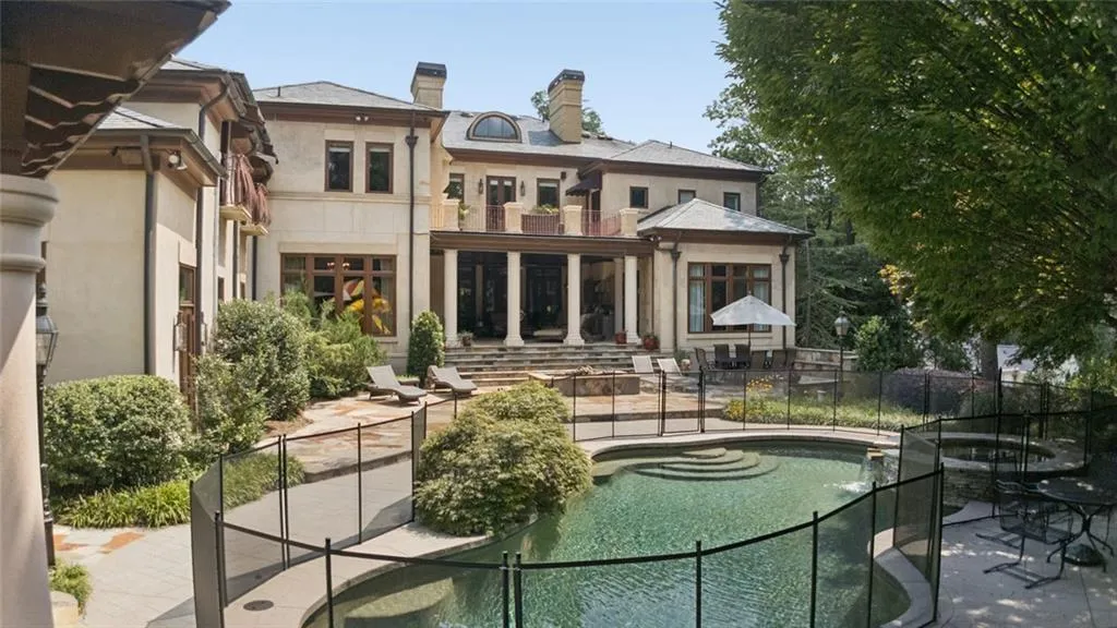 A backyard oasis with pool, spa, and play area — fun for the whole family.