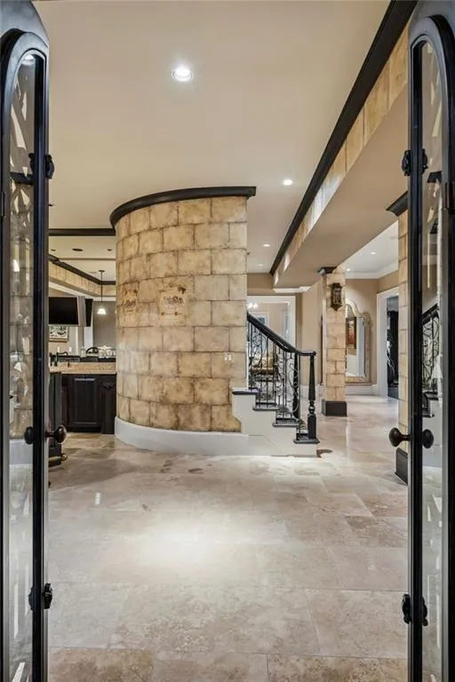 A view from the wine cellar, overlooking the stairs down to the terrace level.