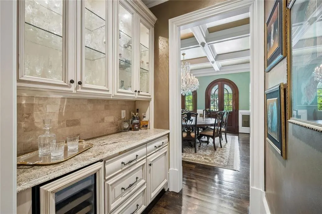 The butler’s pantry connects effortlessly to the formal dining room.