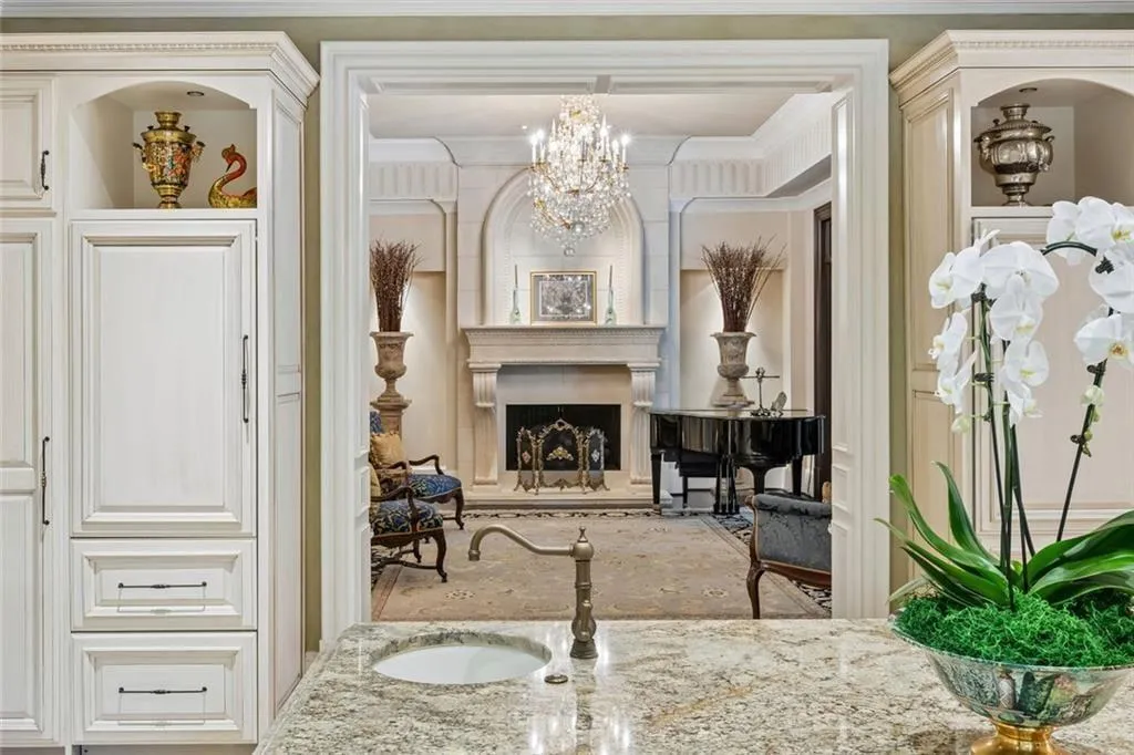 A glimpse from the kitchen into the formal living room.