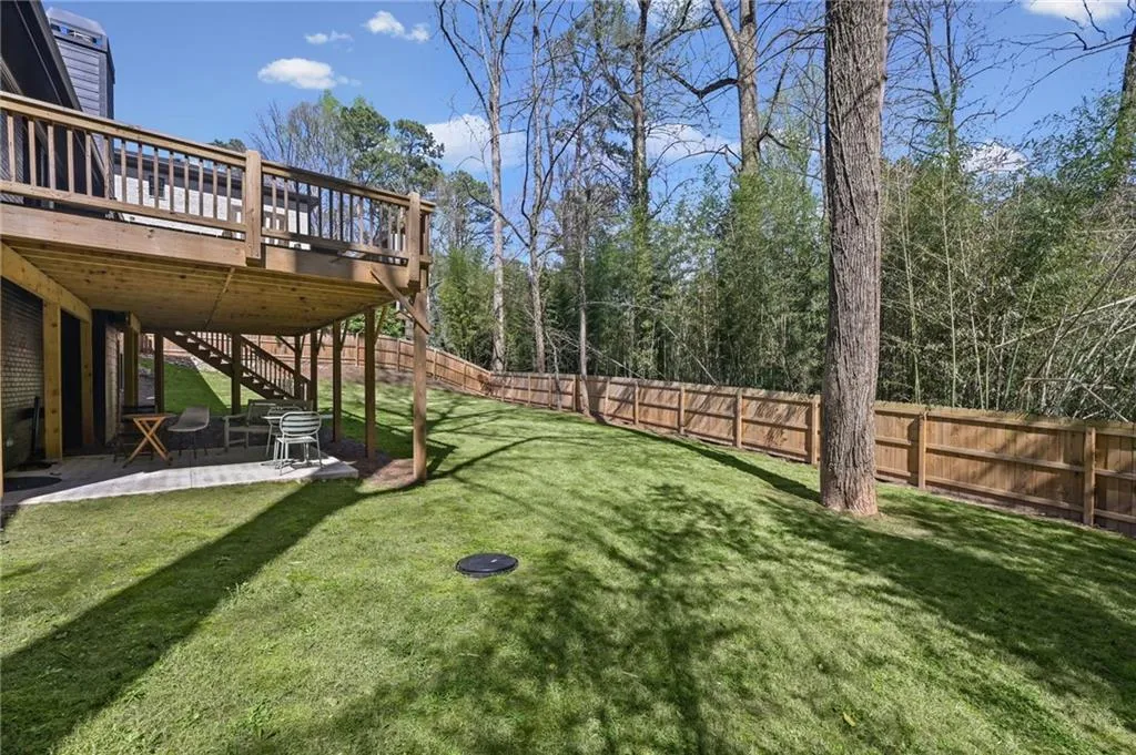 Covered backyard patio provides privacy