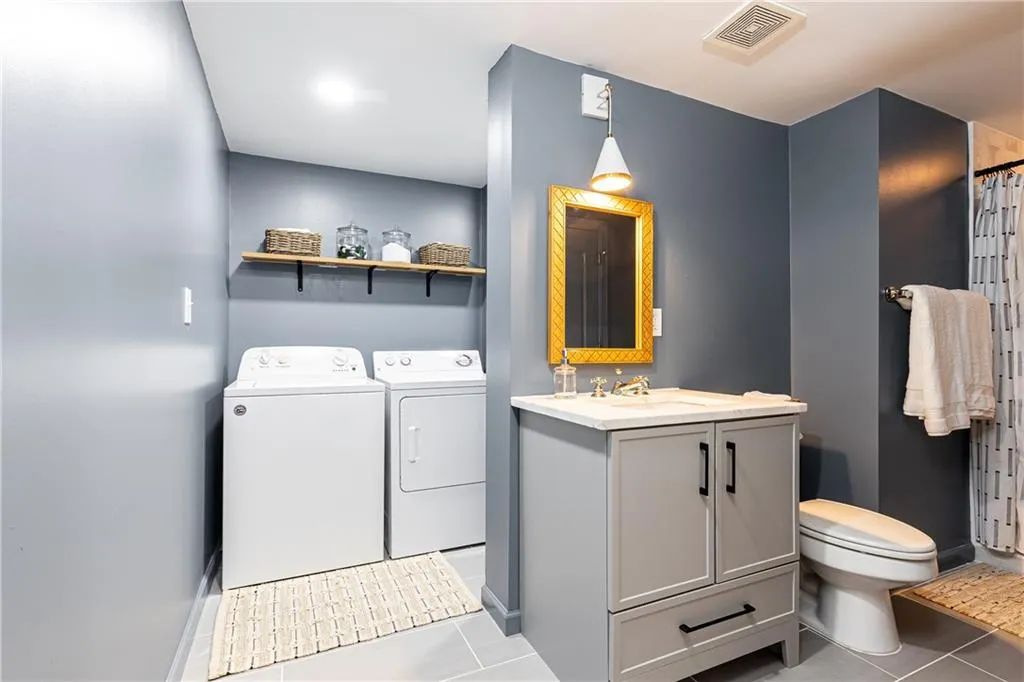 Lower level Bathroom and laundry ( could add barn door for more seperation)