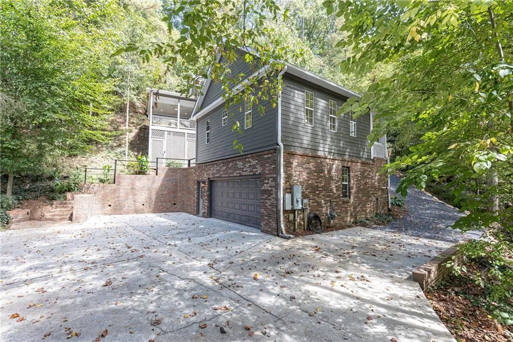 2 car garage at bottom level of carriage house