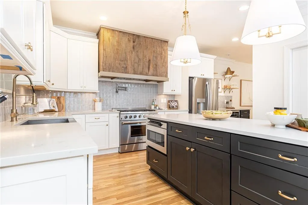 Stainless steel appliances throughout kitchen including drawer microwave
