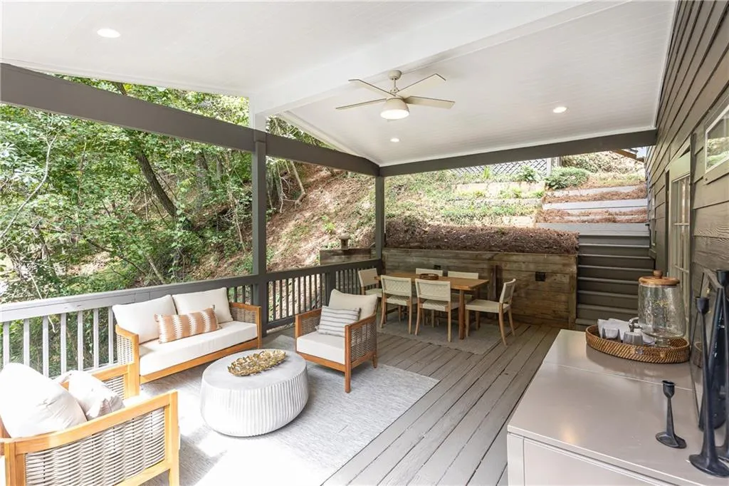 Plenty of room for outdoor living and dining.. need an outdoor fireplace?   The left side of this porch would be a great place to add one!