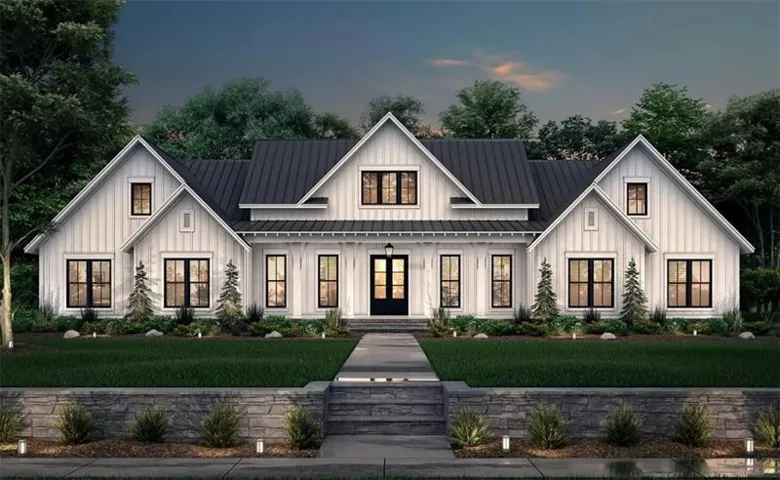 Modern farmhouse exterior featuring white board and batten siding, a dark metal roof, and black-framed windows