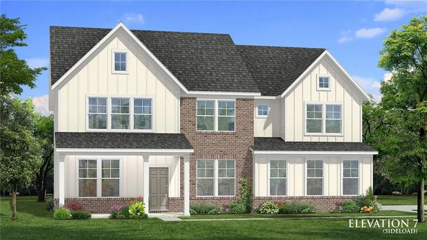 Modern farmhouse design showcasing a brick and board-and-batten exterior with multiple peaked gable rooflines and architectural depth