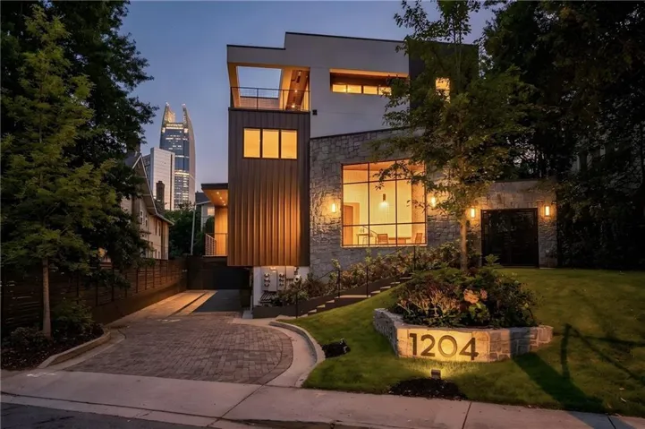 Welcome to 1204 On The Park! One of 3 homes situated across the street from Piedmont Park & The Piedmont Driving Club.