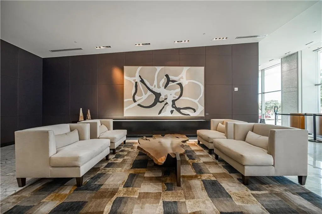 Lobby featuring a wall of windows