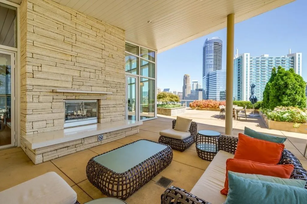 View of patio featuring a skyline view and outdoor lounge area