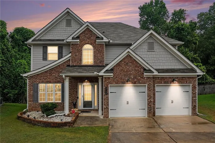 Brick and siding exterior with gabled roof lines