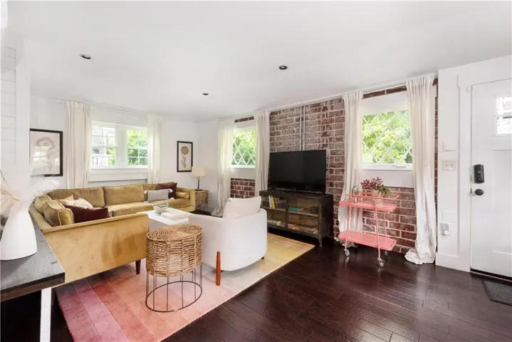 Living area with wood-type flooring