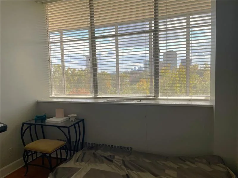 secondary bedrrom with city view could make a great at home office or study