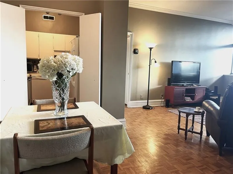 Dining area featuring open plan and oak flooring