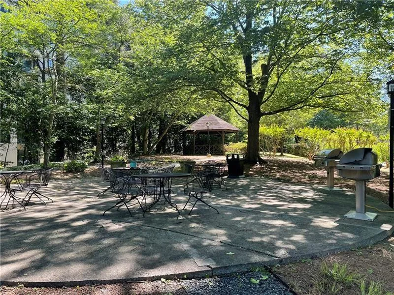 View of patio featuring area for grilling